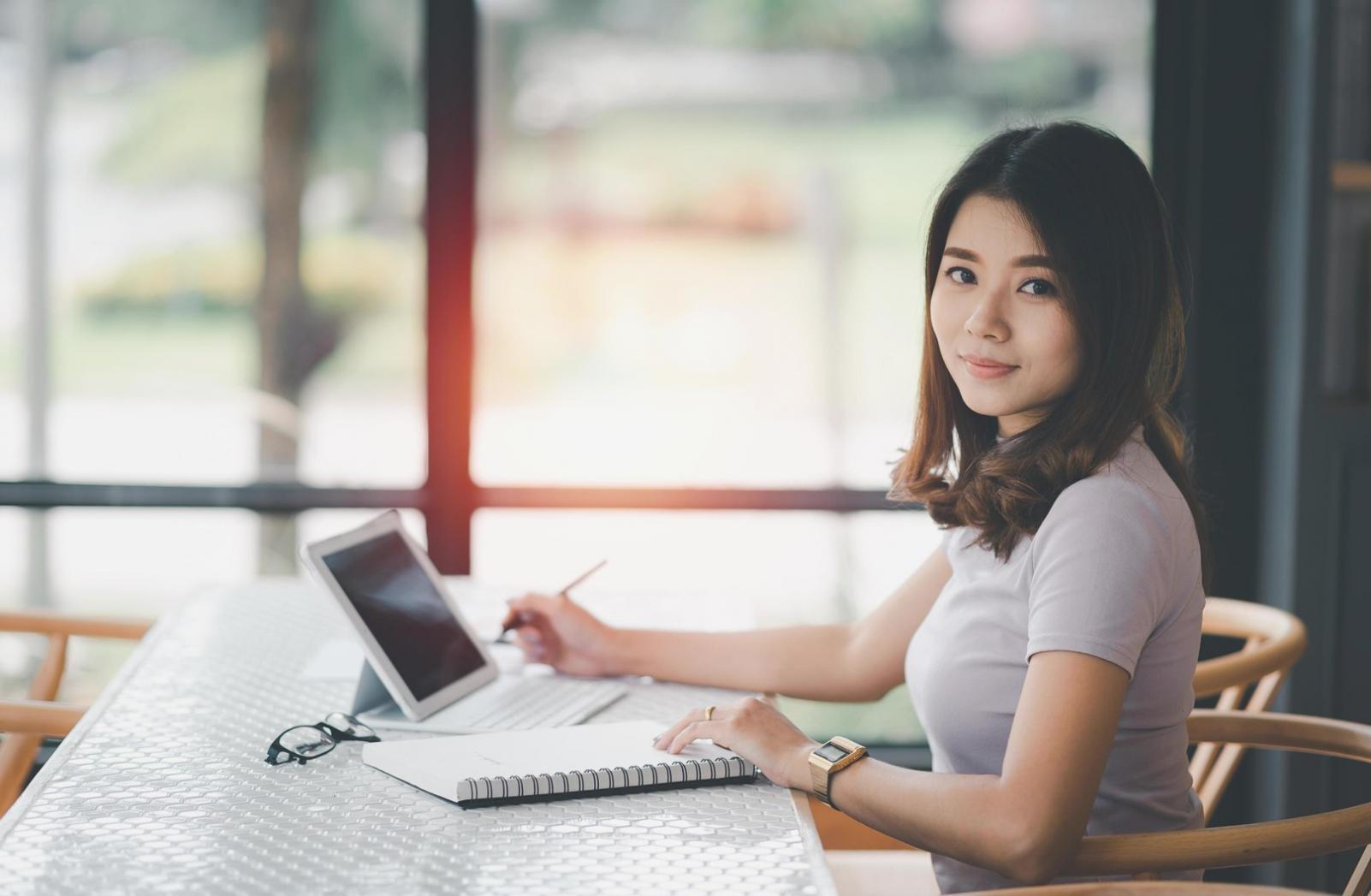 Young couple reviewing mortgage and home buying documents