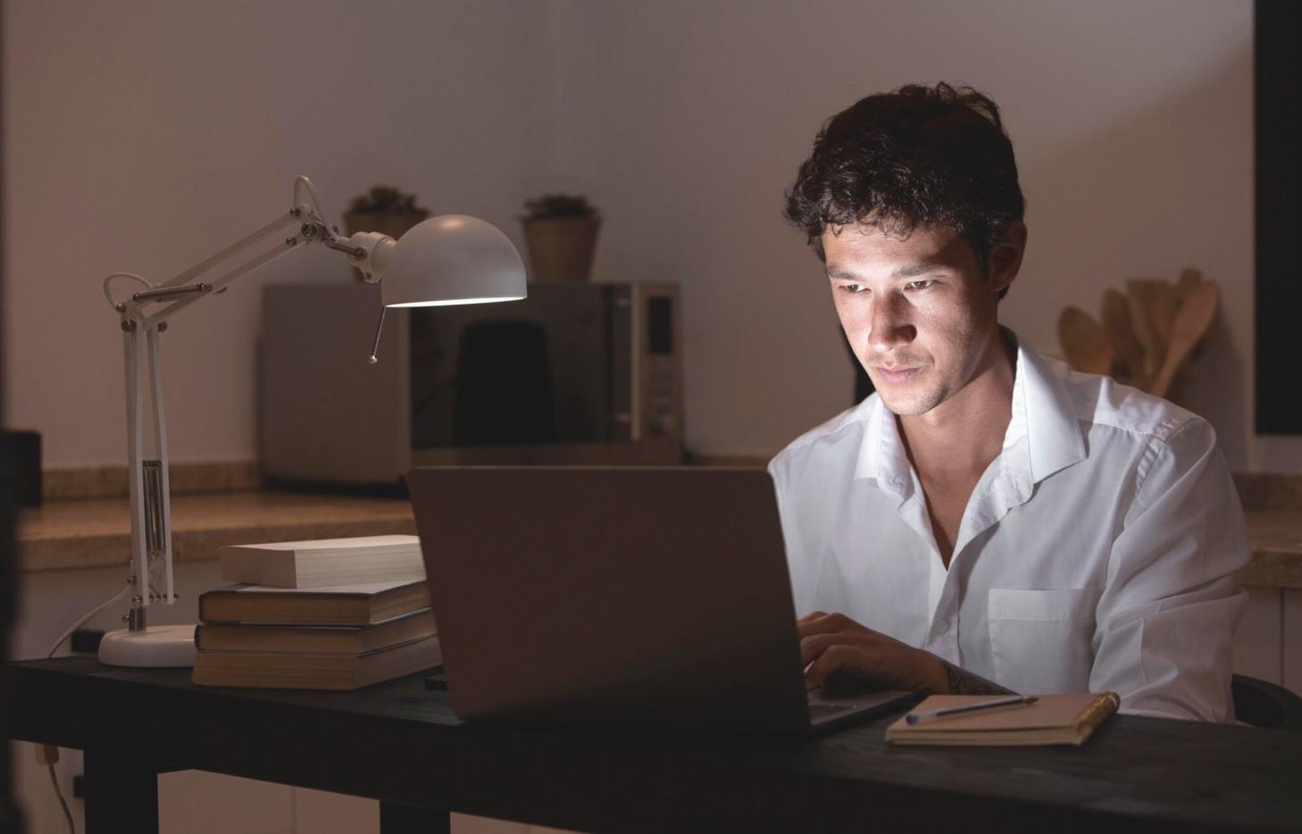 Multi-generational family having dinner together, representing long-term financial security