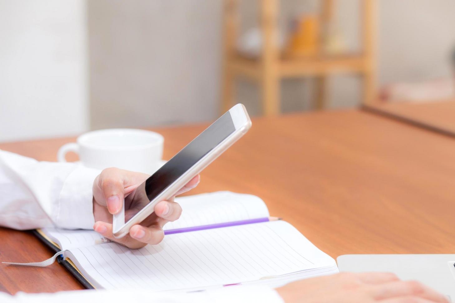 Financial planning materials and calculators spread on table during family budgeting session